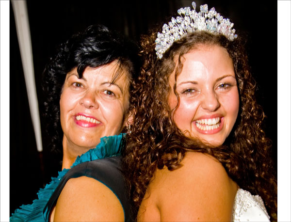 bride with her Mum at evening wedding reception