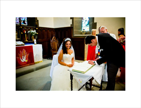 signing the register at Christ Church wedding