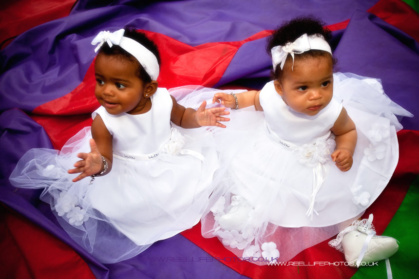 Twins, Africa and Aamori in Baby Dior Christening dresses