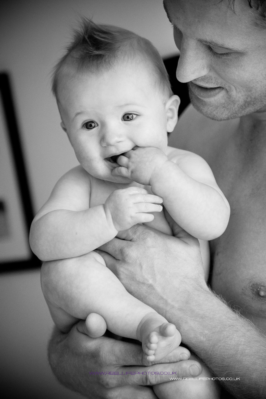 Black and white baby photo  of Jack with his Dad