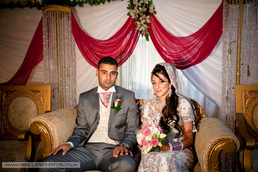 Asian Bride and Groom on the stage at Al Hikmah Centre in Batley