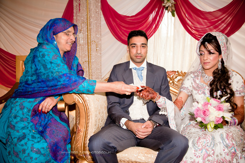 Traditional gifts of money at Asian wedding