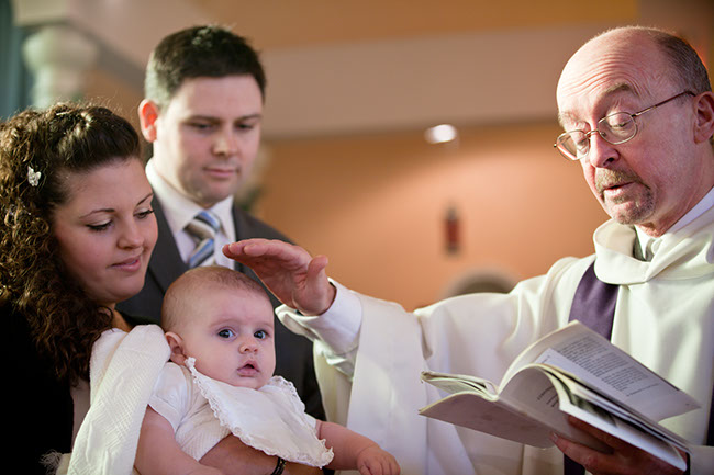 Father blessing William at his Christening in Leeds