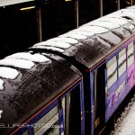 Platform one in the snow with train at Dewsbury Railway Station
