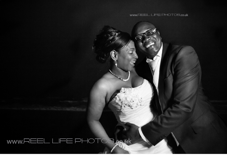 fun black and white wedding photography in the Gambia at Coco Ocean at night