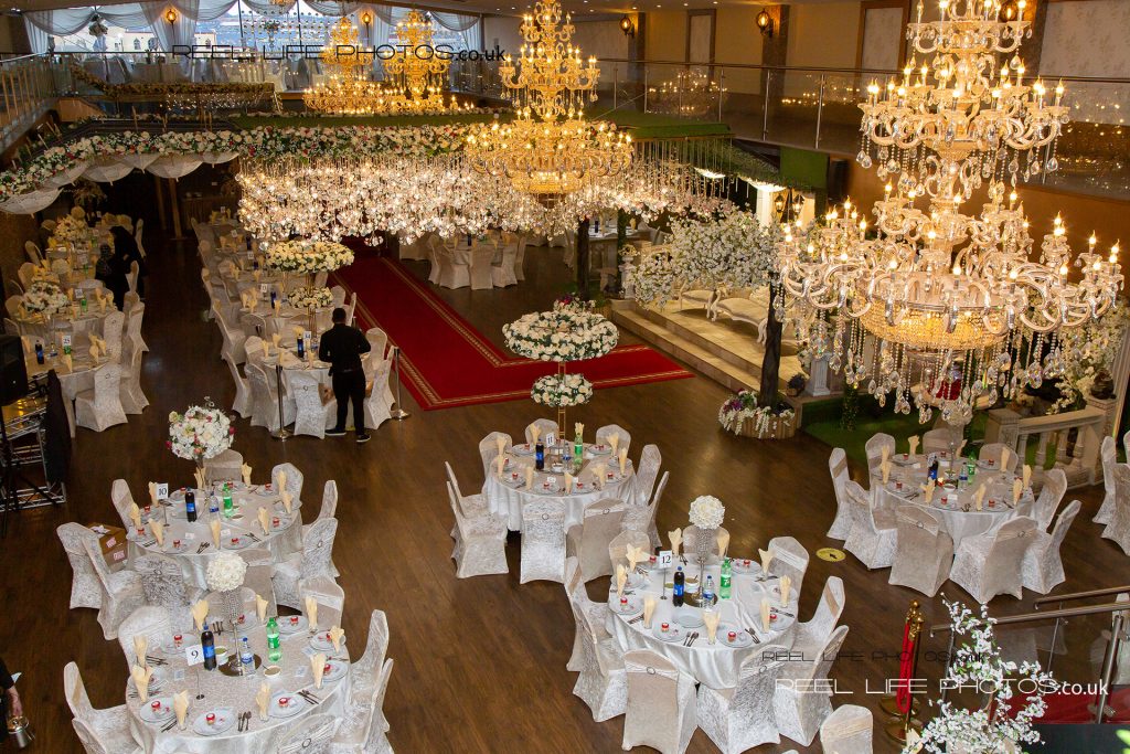 Chandeliers and flower lights and a magnificent stage at the Grand banqueting Suite 2022.